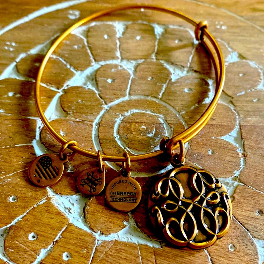Gold charm bracelet .